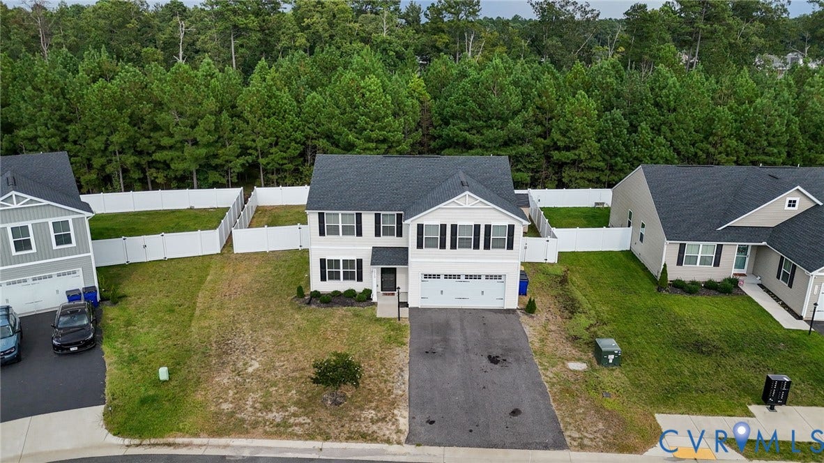 5713 Bison Ford Court, Chesterfield, VA 23234 Two-story property with a dark shingle roof, white siding, and black window shutters