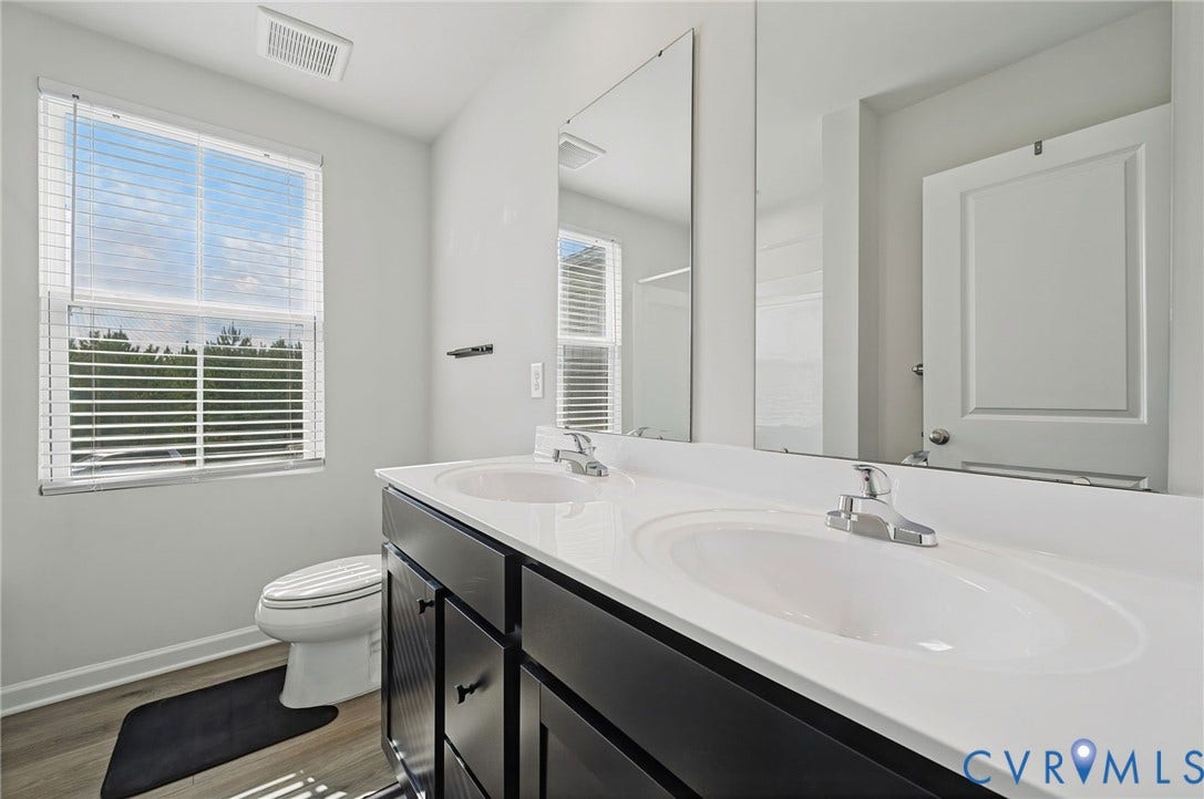 5713 Bison Ford Court, Chesterfield, VA 23234 Dual vanity with integrated sinks and chrome fixtures