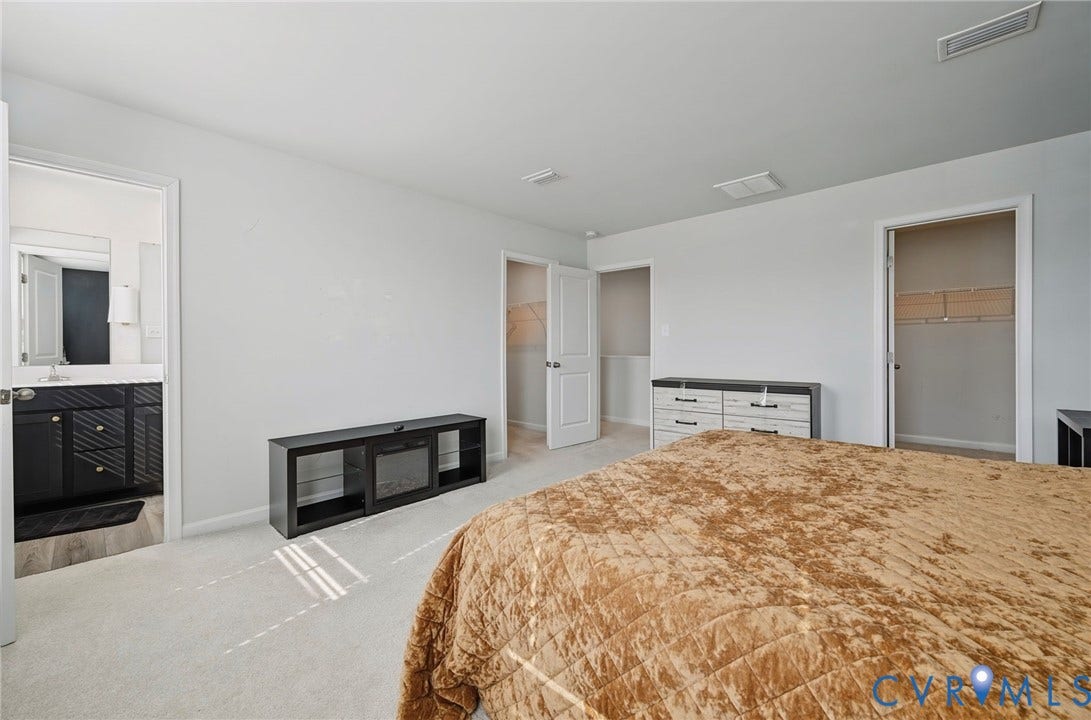 5713 Bison Ford Court, Chesterfield, VA 23234 Light-colored carpeting throughout, white wall finishes, and multiple doorways