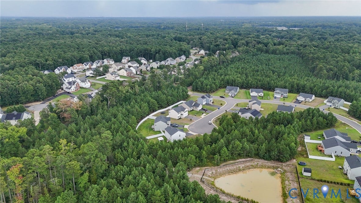 5713 Bison Ford Court, Chesterfield, VA 23234 Residential development surrounded by extensive natural tree coverage