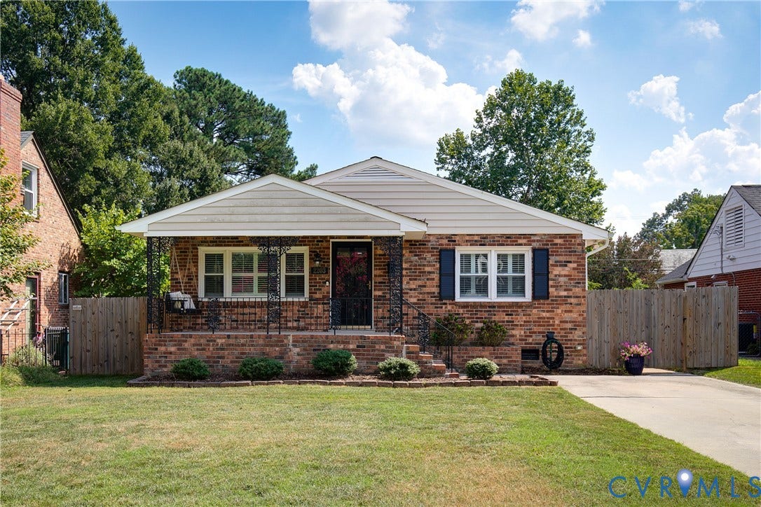 2203 Wedgewood Avenue, Henrico, VA 23228 Brick exterior, covered front porch, white window frames, dark shutters, and a paved driveway