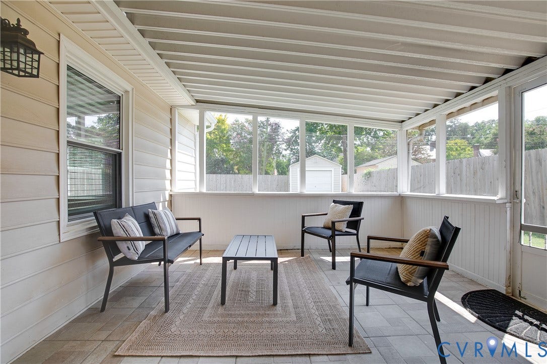 2203 Wedgewood Avenue, Henrico, VA 23228 Enclosed patio featuring a slatted ceiling, large windows, light-toned siding, and tiled flooring