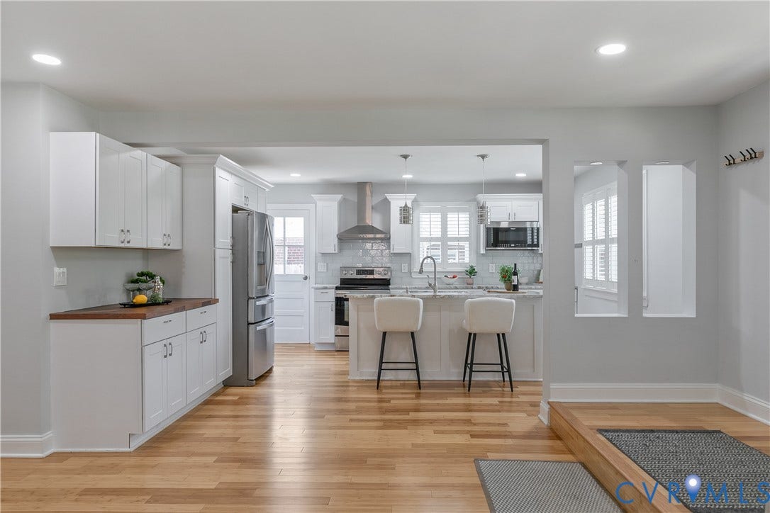 2203 Wedgewood Avenue, Henrico, VA 23228 Open-concept kitchen with recessed lighting, white shaker cabinetry, stainless steel appliances, and wood-finish flooring