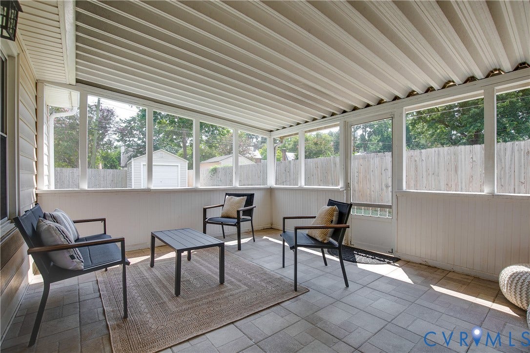 2203 Wedgewood Avenue, Henrico, VA 23228 Screened-in patio with a corrugated ceiling, tile flooring, and a paneled lower wall