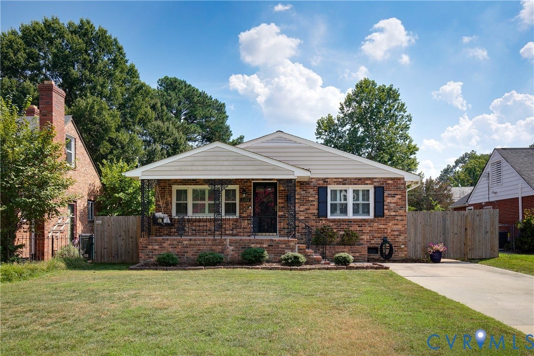 2203 Wedgewood Avenue, Henrico, VA 23228 Brick facade with white siding accents and a covered front porch featuring wrought iron railing
