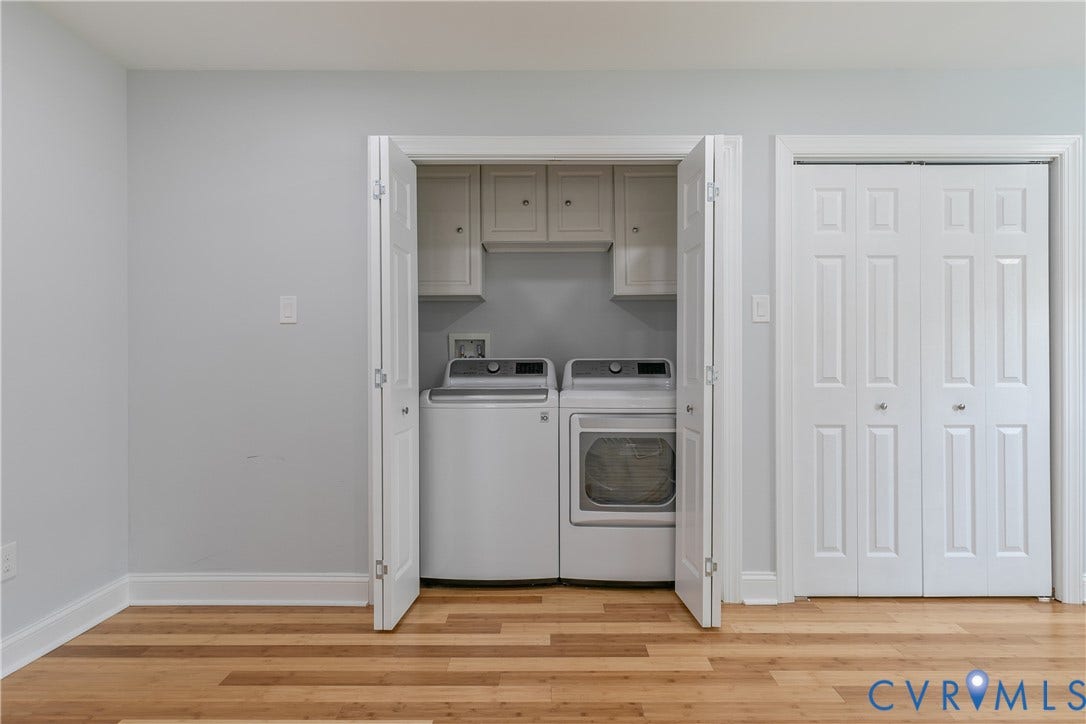 2203 Wedgewood Avenue, Henrico, VA 23228 Dedicated laundry area featuring upper cabinetry and wood-finish flooring