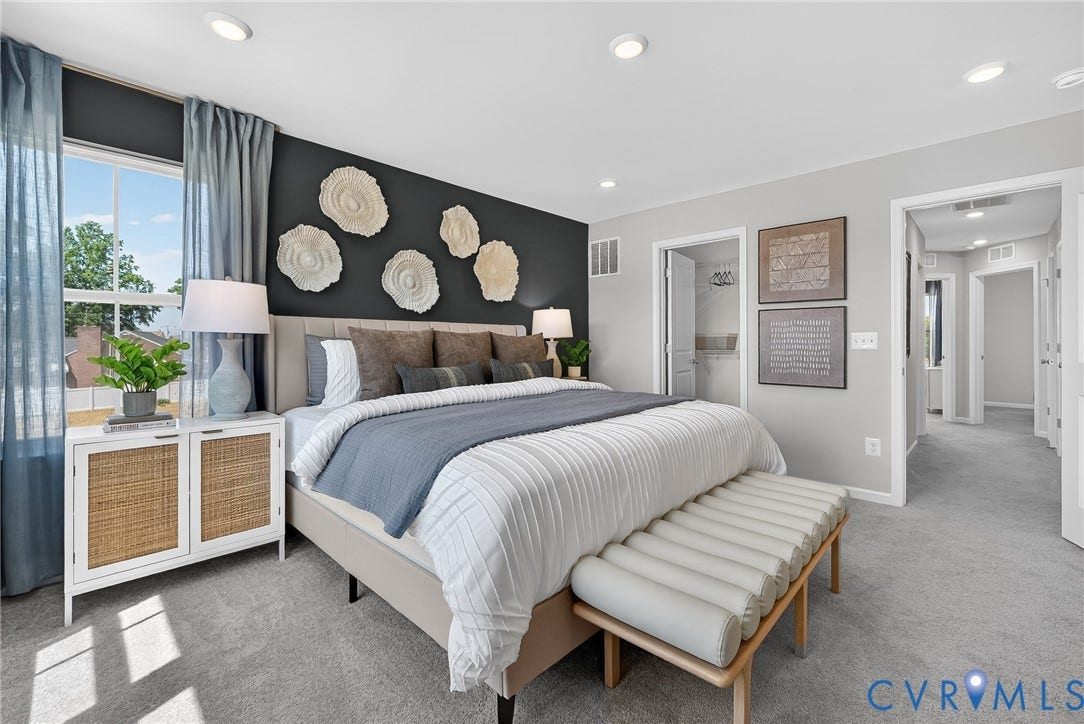 6138 Hull Street Road, Richmond, VA 23224 Recessed lighting, soft gray wall paint, and a window with white trim