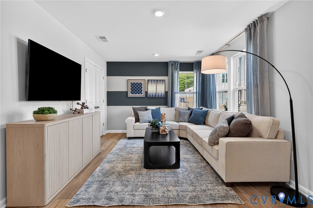 6138 Hull Street Road, Richmond, VA 23224 Recessed lighting, wood-finish flooring, and natural light from large windows