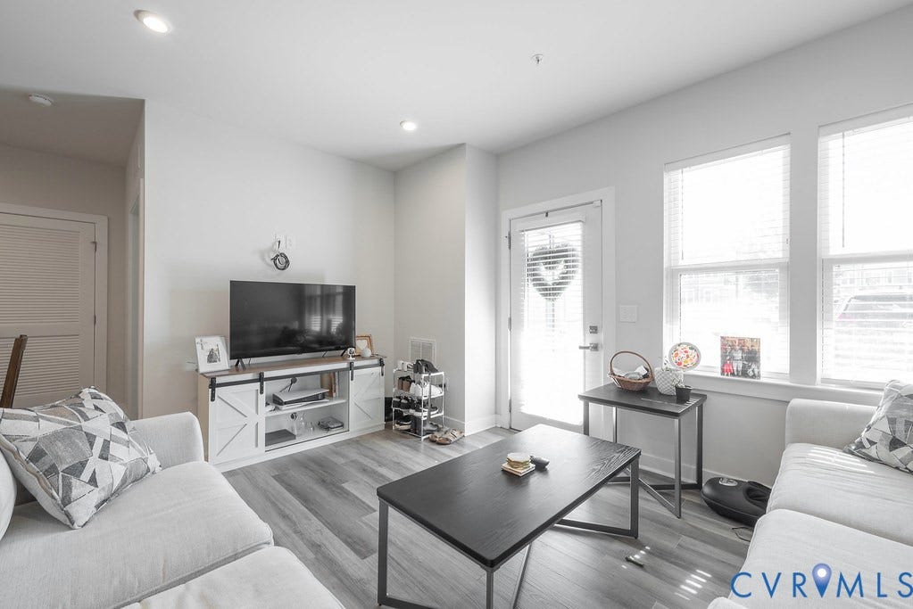 4000 Maze Runner Drive, #101, Midlothian, VA 23112 Recessed ceiling lighting, wood-finish flooring, multiple windows, and a glass-paneled exterior door