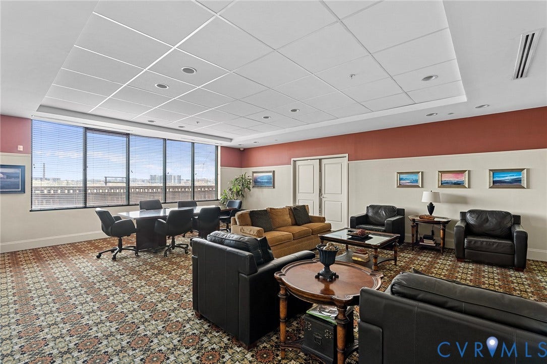 1101 Haxall Point, #U514, Richmond, VA 23219 Expansive windows, patterned carpet, recessed lighting, double panel doors, and a drop ceiling