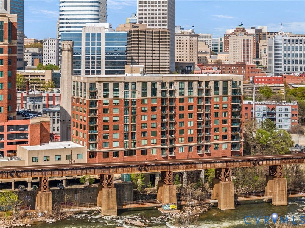 1101 Haxall Point, #U514, Richmond, VA 23219 Multi-story building featuring a brick facade and private balconies