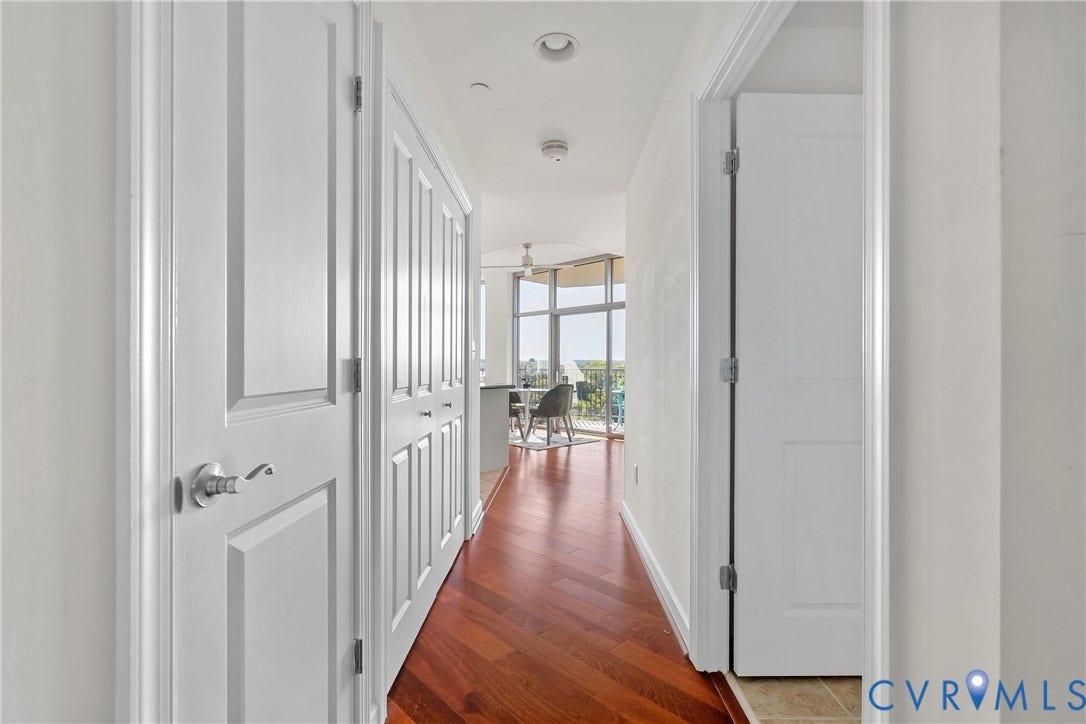 1101 Haxall Point, #U514, Richmond, VA 23219 Hallway featuring wood-finish flooring, recessed lighting, and white paneled doors