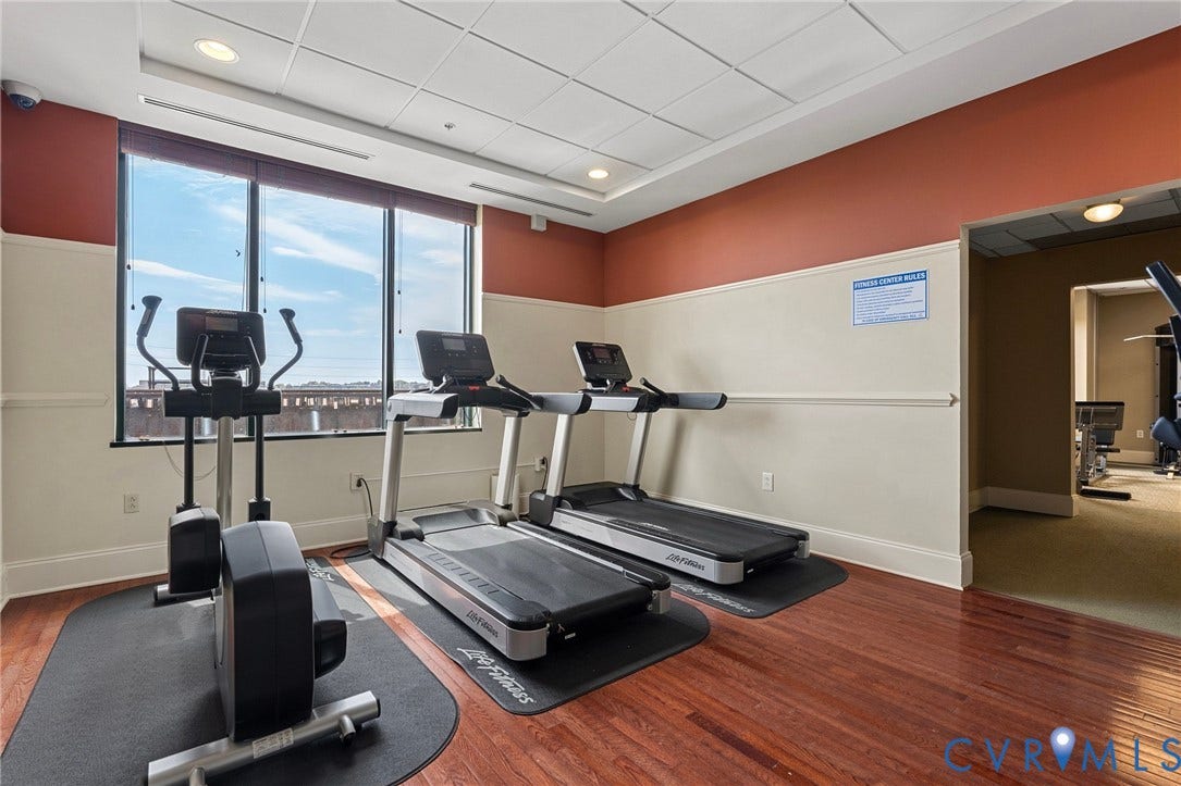 1101 Haxall Point, #U514, Richmond, VA 23219 Fitness center with wood-finish flooring, large windows, and recessed lighting