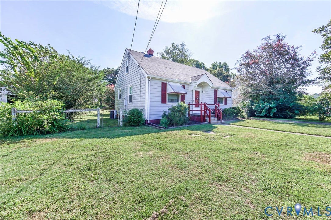 Side View & fenced in backyard