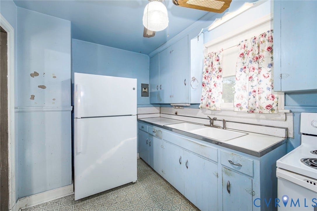 Kitchen with Refrigerator and electric stove