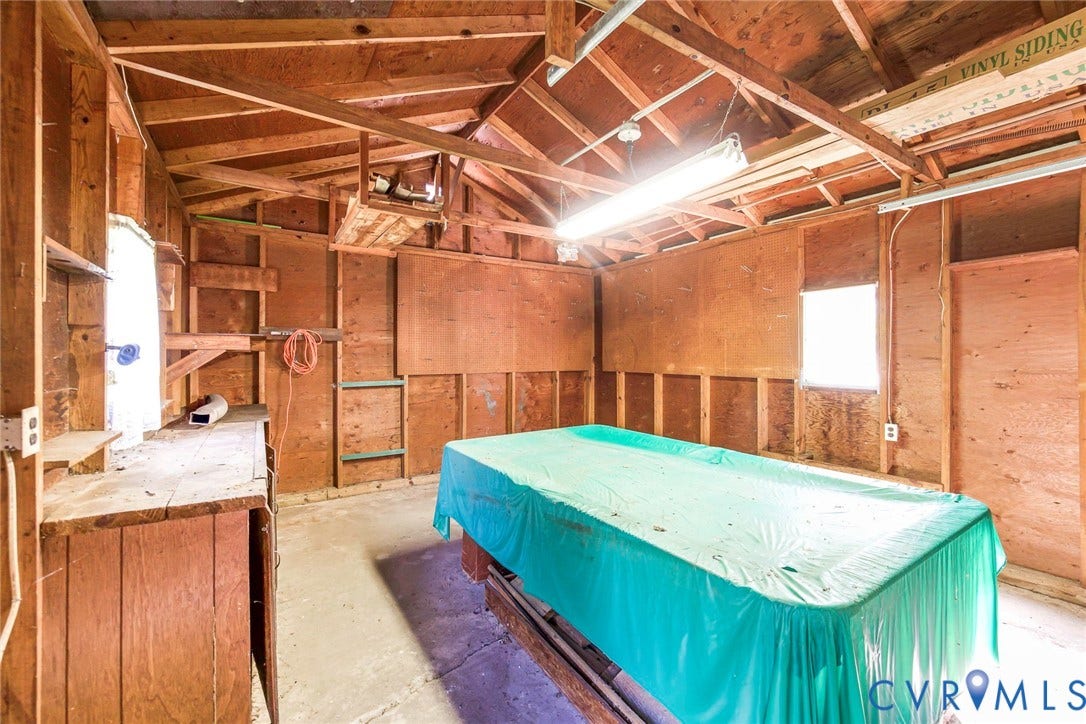 Detached garage with pool table inside