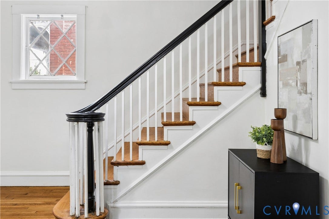 1304 Bainbridge Street, Manchester, Richmond, VA 23224 Hardwood staircase with white risers and black handrail