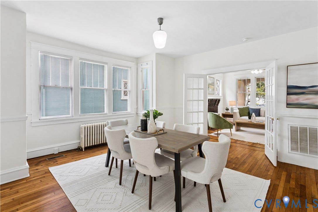 1304 Bainbridge Street, Manchester, Richmond, VA 23224 Hardwood flooring throughout, multiple windows, classic white trim, and a built-in radiator