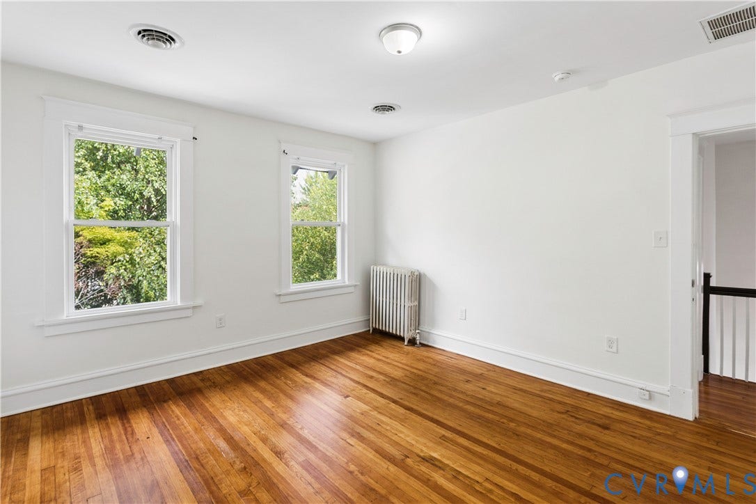 1304 Bainbridge Street, Manchester, Richmond, VA 23224 Hardwood flooring and dual windows with white trim