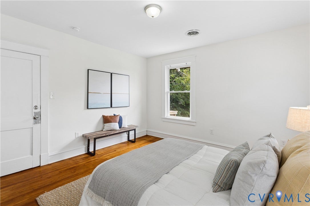 1304 Bainbridge Street, Manchester, Richmond, VA 23224 Recessed lighting, wood-finish flooring, white trim, and a window with natural light