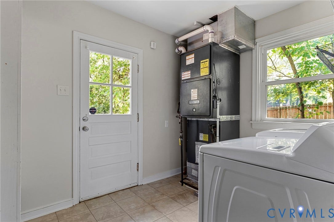 5968 Forest Hill Avenue, Westlake Hills, Richmond, VA 23225 Utility area with a transom-style door, tiled flooring, and a single window