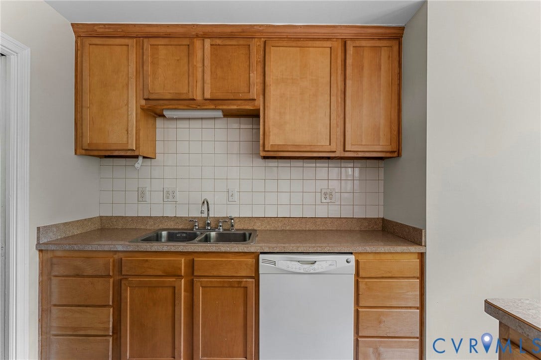 5968 Forest Hill Avenue, Westlake Hills, Richmond, VA 23225 Kitchen featuring wood cabinetry, a double basin stainless steel sink, tile backsplash, and a built-in dishwasher