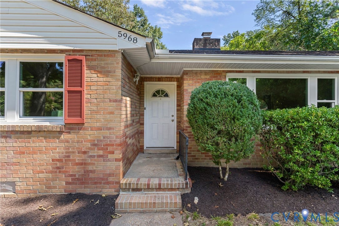 5968 Forest Hill Avenue, Westlake Hills, Richmond, VA 23225 Brick exterior with white trim, a white front door, and red window shutters