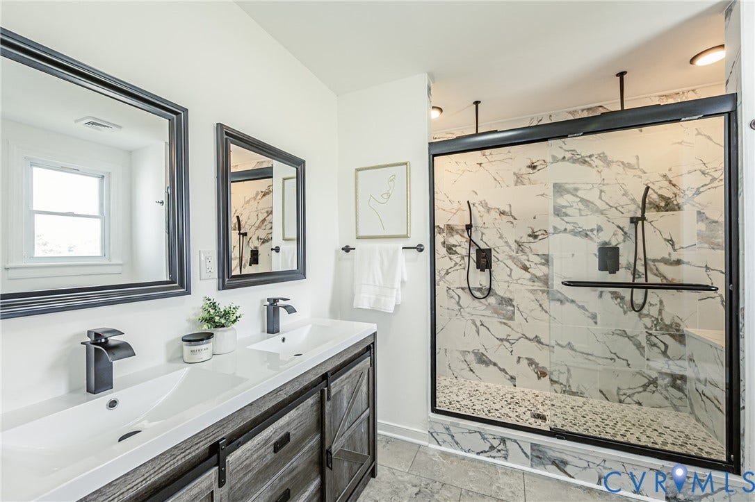 4008 River Road, Chesterfield, VA 23803 Dual vanity with integrated sinks, framed mirrors, and black-finish fixtures