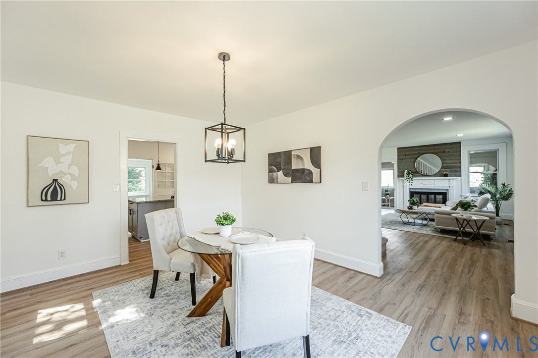 4008 River Road, Chesterfield, VA 23803 Light wood-finish flooring throughout, featuring a rectangular chandelier with a matte black frame