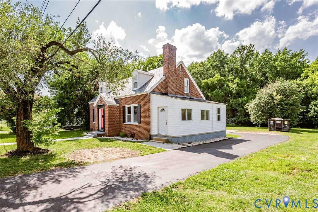 4008 River Road, Chesterfield, VA 23803 Brick facade with white siding accents and a contrasting red entry door