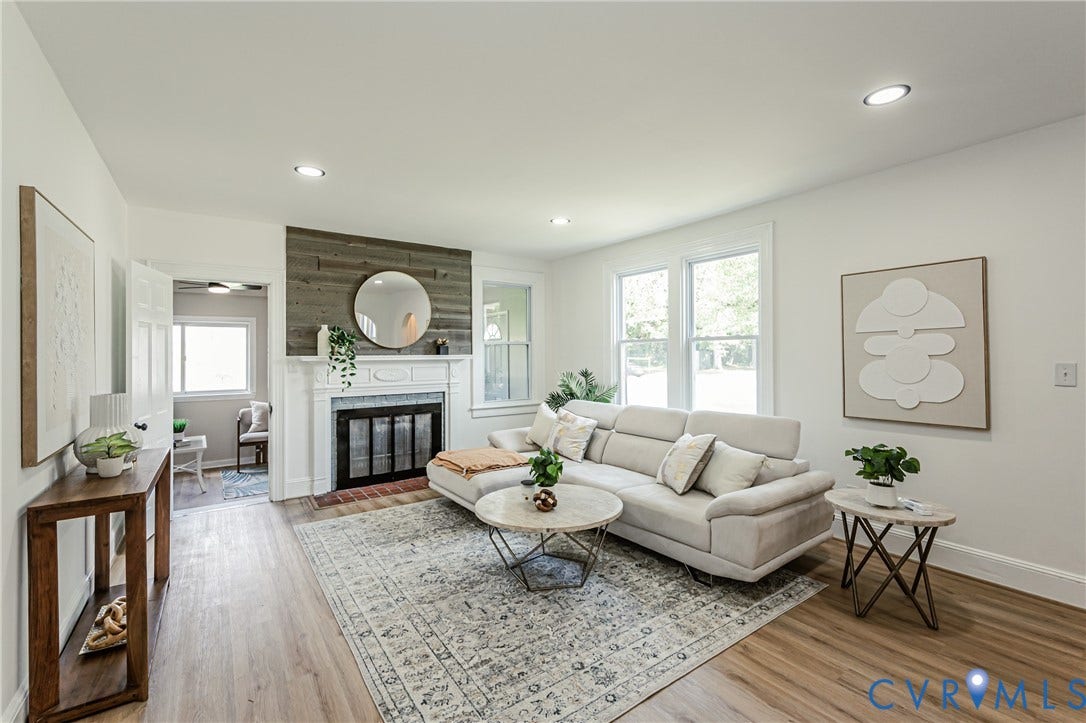4008 River Road, Chesterfield, VA 23803 Recessed lighting, wood-finish flooring, and a fireplace with a white mantel and wood paneling