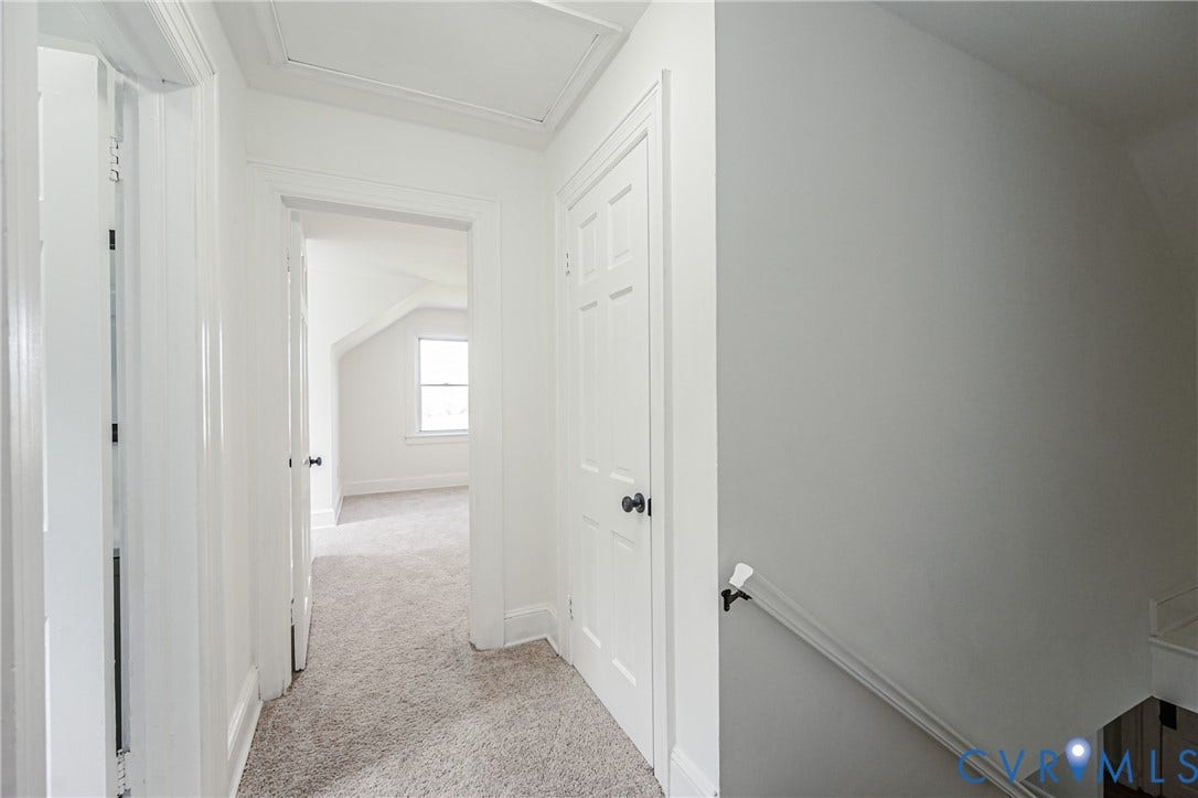 4008 River Road, Chesterfield, VA 23803 Hallway with light gray carpeting, white painted walls, and white trim