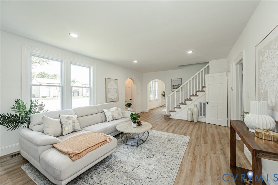 4008 River Road, Chesterfield, VA 23803 Recessed lighting, wood-finish flooring, white trim, and a white staircase with wood treads