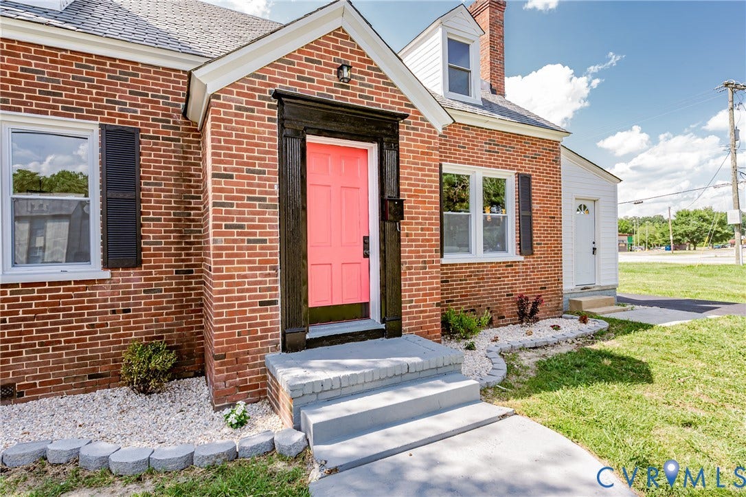 4008 River Road, Chesterfield, VA 23803 Brick exterior with white-framed windows and black shutters