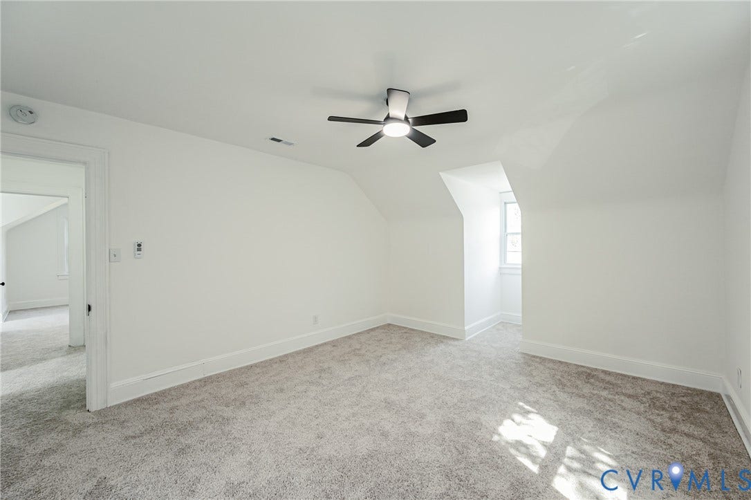 4008 River Road, Chesterfield, VA 23803 Sloped ceilings, overhead ceiling fan, window alcove, and neutral carpet flooring