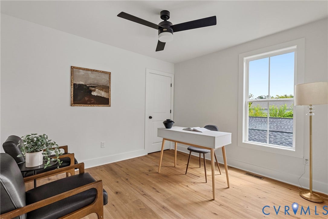 2004 Newbourne Street, Richmond, VA 23223 Hardwood-finish flooring, white walls, black ceiling fan, white trim, and a white interior door