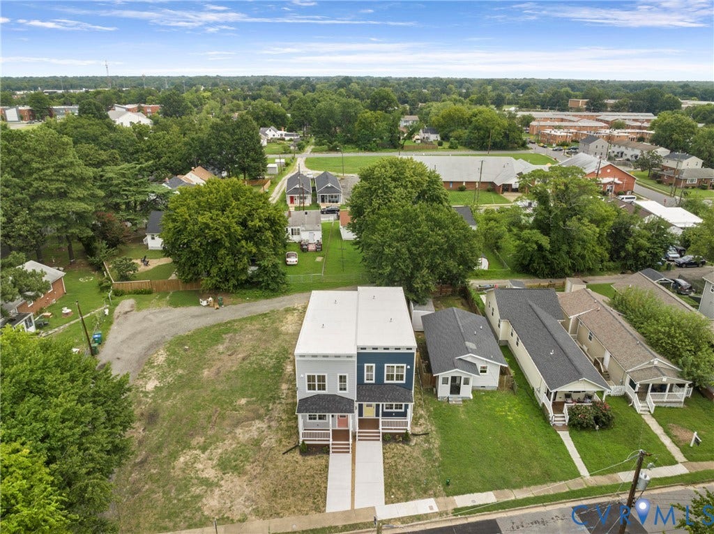 2004 Newbourne Street, Richmond, VA 23223 Modern duplex residence featuring a two-story design, dual entryways, and contrasting exterior finishes
