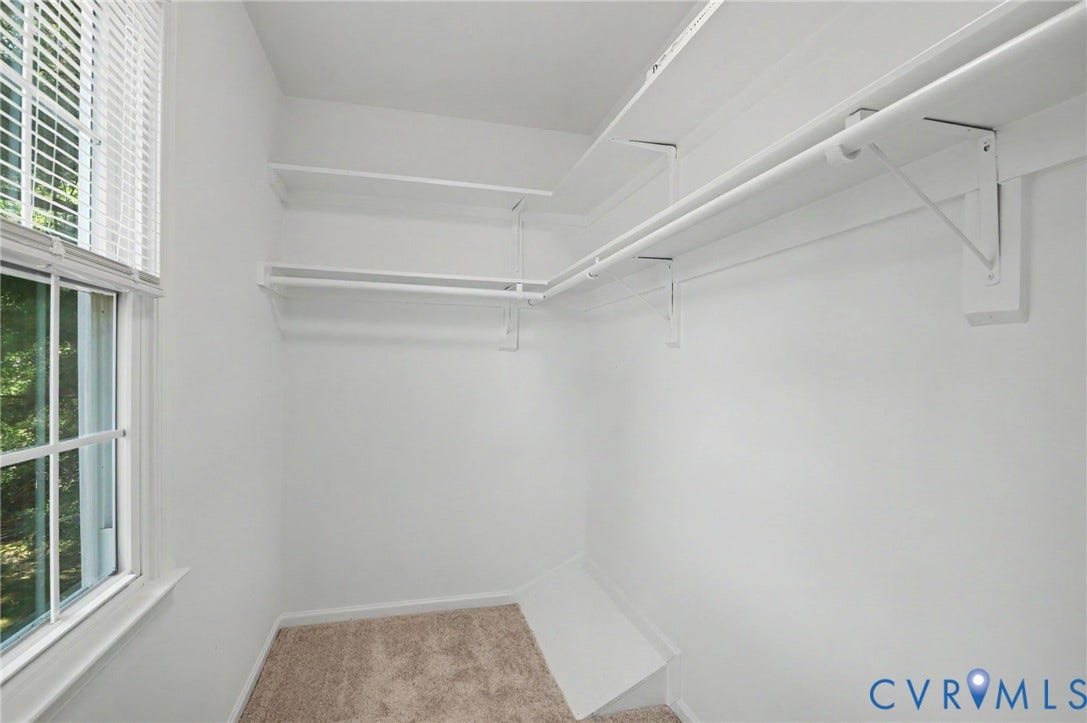 1555 Skirmish Run Drive, #1555, Henrico, VA 23228 Spacious walk-in closet with shelving and hanging rods