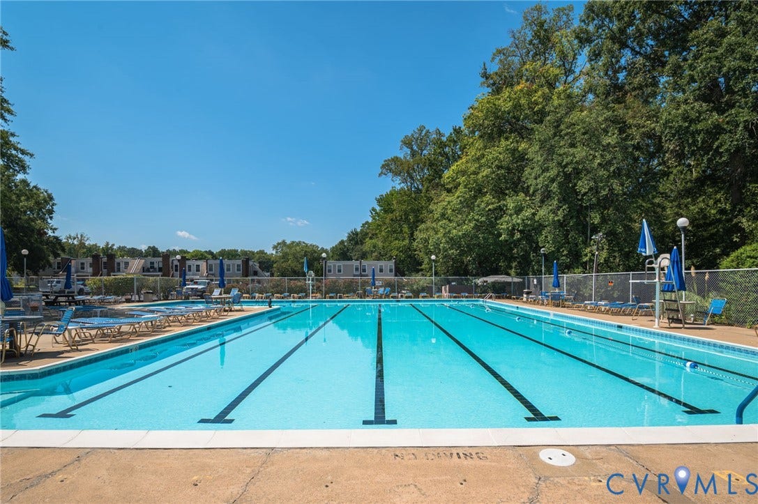 1555 Skirmish Run Drive, #1555, Henrico, VA 23228 Community swimming pool featuring lap lanes and integrated entry steps