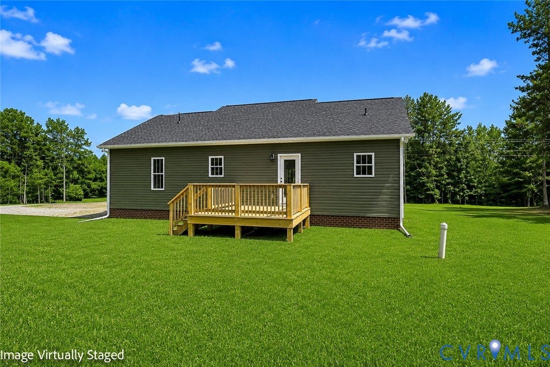 3289 Cumberland Road, Cumberland, VA 23040 Front exterior with dark gray siding, white trim, and a covered porch featuring white columns