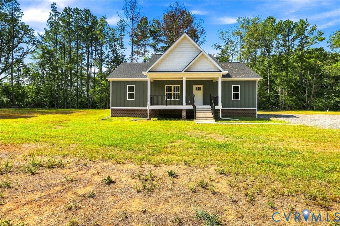 3289 Cumberland Road, Cumberland, VA 23040 Single-story residence featuring a dark-toned facade and an inviting covered porch