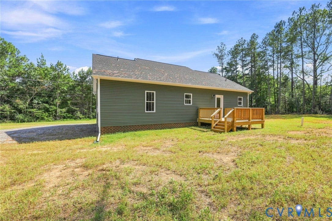 3289 Cumberland Road, Cumberland, VA 23040 Contemporary home exterior featuring dark gray siding, white trim, and a covered front porch with dark railings