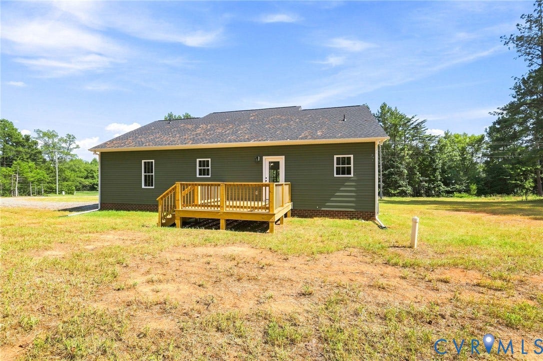 3289 Cumberland Road, Cumberland, VA 23040 Front exterior with dark gray siding, white trim, and a covered porch featuring white columns