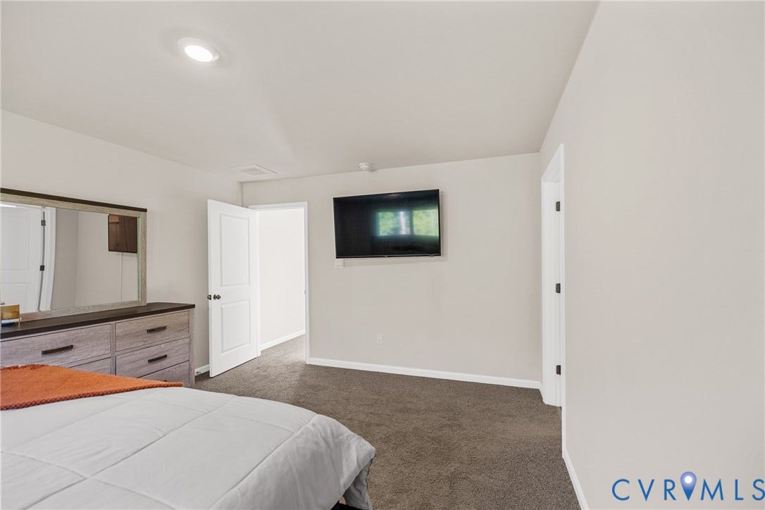 7974 Arbor Marsh Terrace, New Kent, VA 23124 Recessed ceiling lighting, light gray wall finishes, and dark gray carpeting