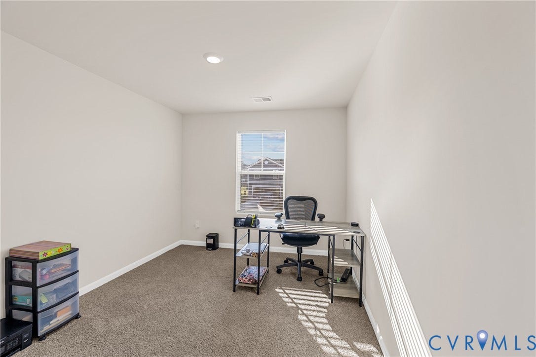7974 Arbor Marsh Terrace, New Kent, VA 23124 Recessed lighting, neutral wall paint, carpeted flooring, and a single window with blinds