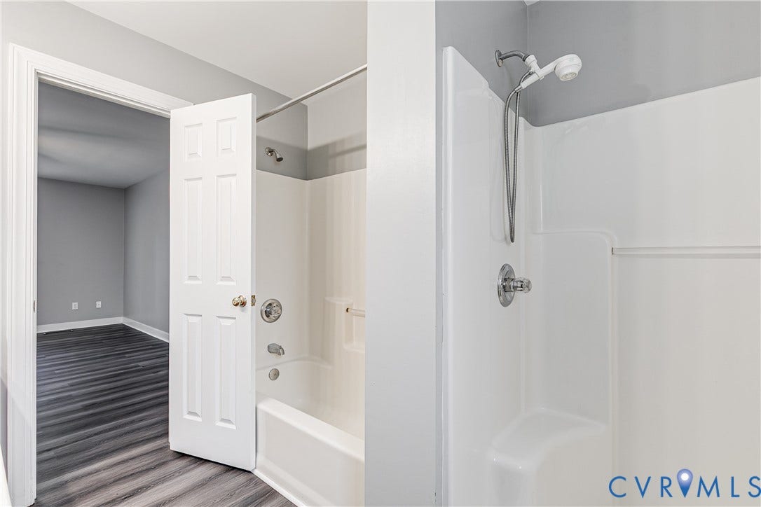 3207 Ludgate Road, Chester, VA 23831 Primary bathroom with a soaking tub and a walk in shower