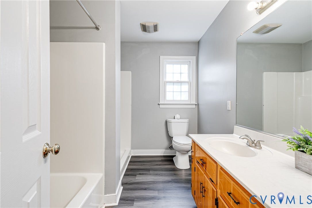 3207 Ludgate Road, Chester, VA 23831 Primary bathroom with a soaking tub and a walk in shower