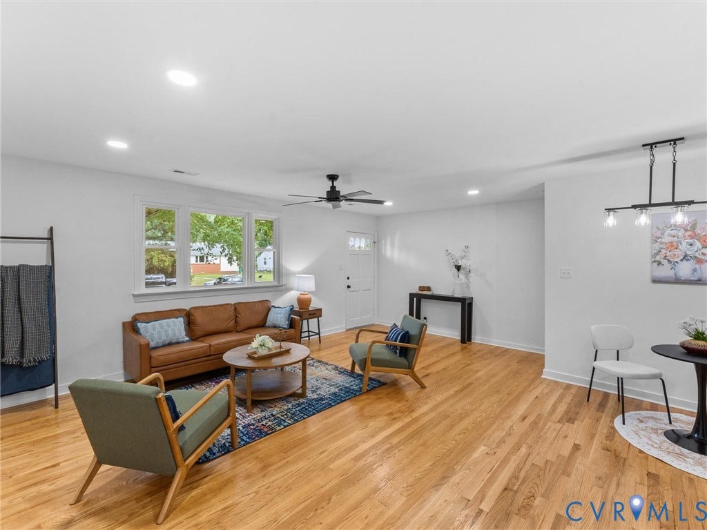 3626 Reynolds Road, Richmond, VA 23223 Hardwood flooring, recessed lighting, ceiling fan, white paneled entry door, and large multi-pane window