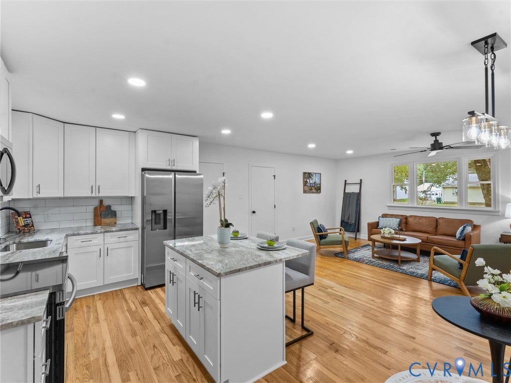 3626 Reynolds Road, Richmond, VA 23223 Open concept living area featuring wood-finish flooring, recessed lighting, and a ceiling fan