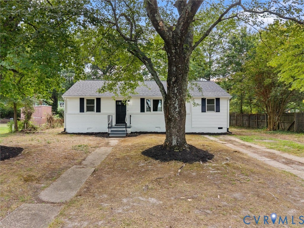3626 Reynolds Road, Richmond, VA 23223 White siding exterior with dark shutters, front entry steps, and an asphalt shingle roof